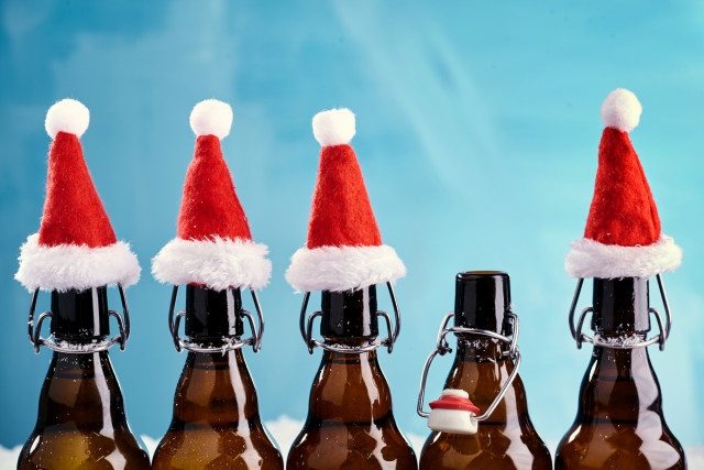 Bottles with Santa hats