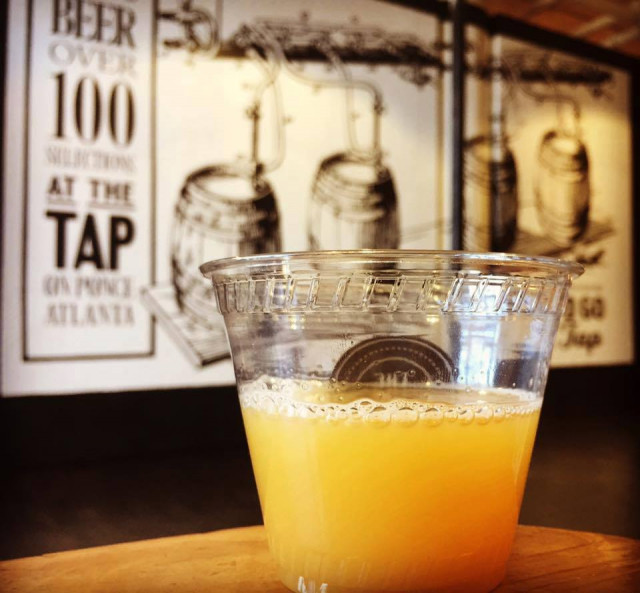 Hazy beer pour outside The Tap on Ponce.