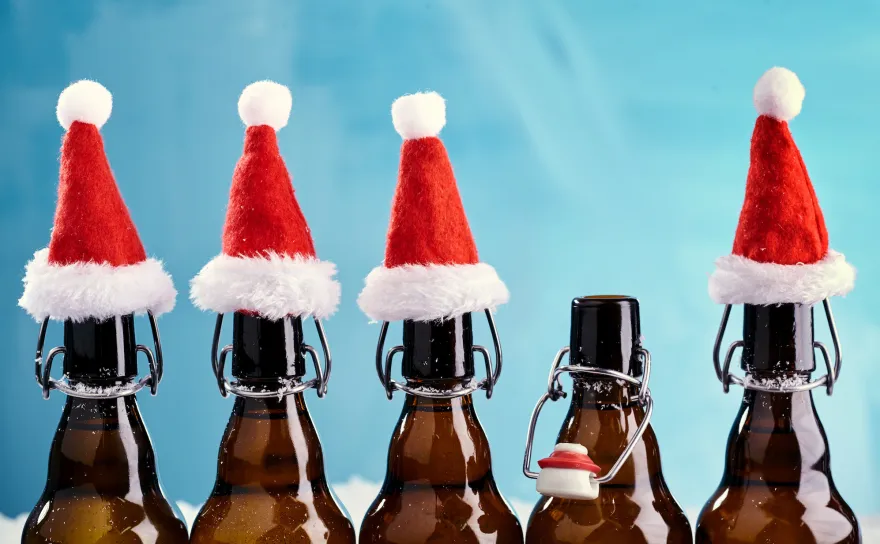 Bottles with Santa hats