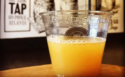 Hazy beer pour outside The Tap on Ponce. 